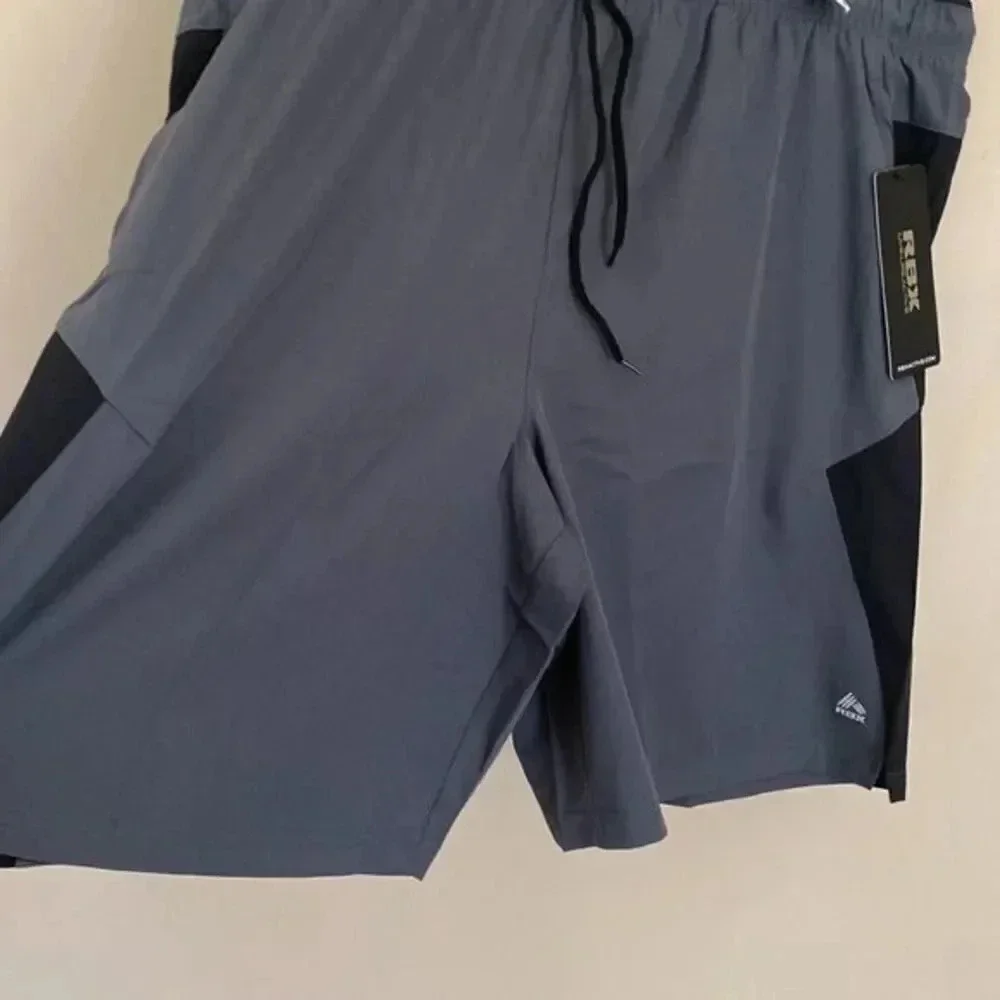 - RBX Active Men's  Stretch Woven  short